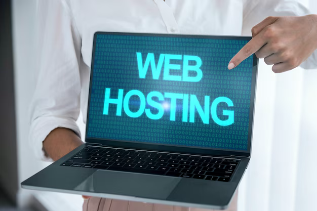 Hands holding laptop with inscription web hosting