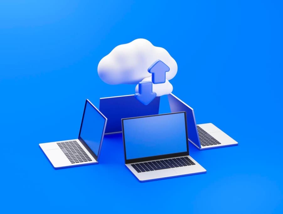 Three laptops connected to a stylized cloud representing cloud computing